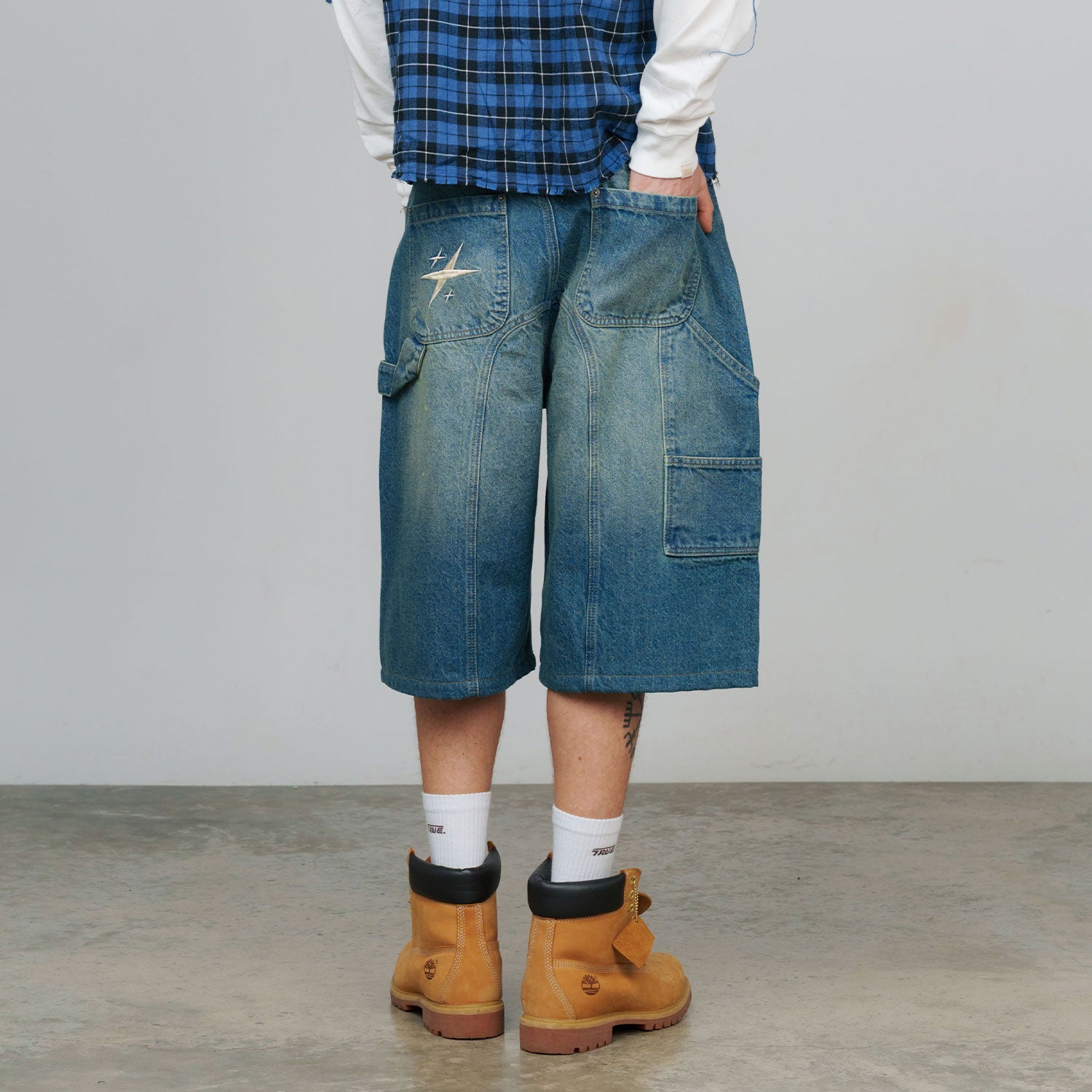 SLASHED DENIM JORTS - BLUE