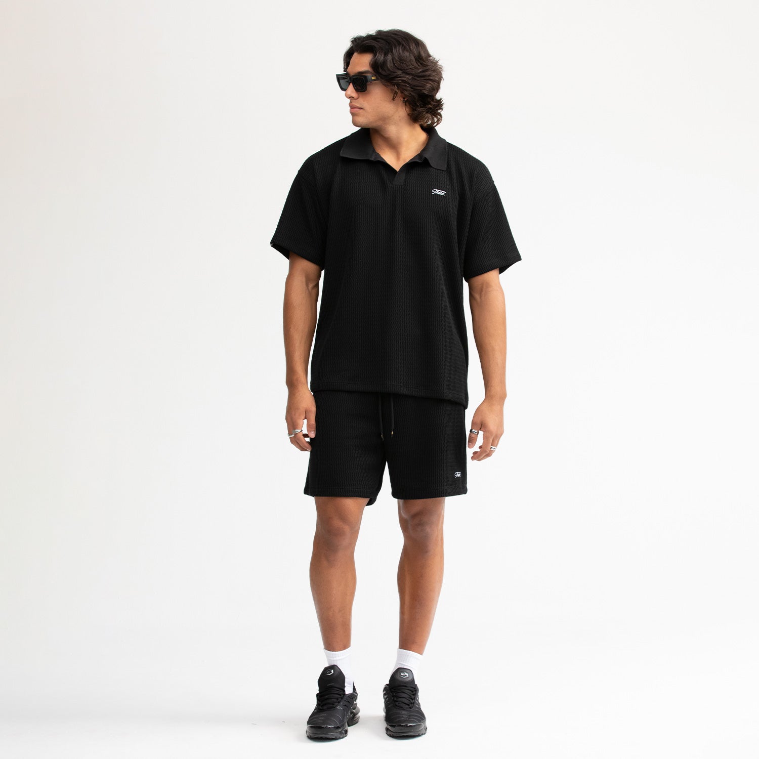 KNIT RESORT POLO - BLACK